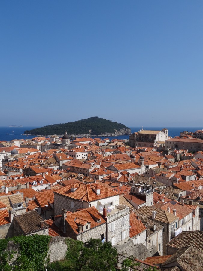 Terracotta roofs of Dubrovnik Old Town and the view out to Lokrum Island