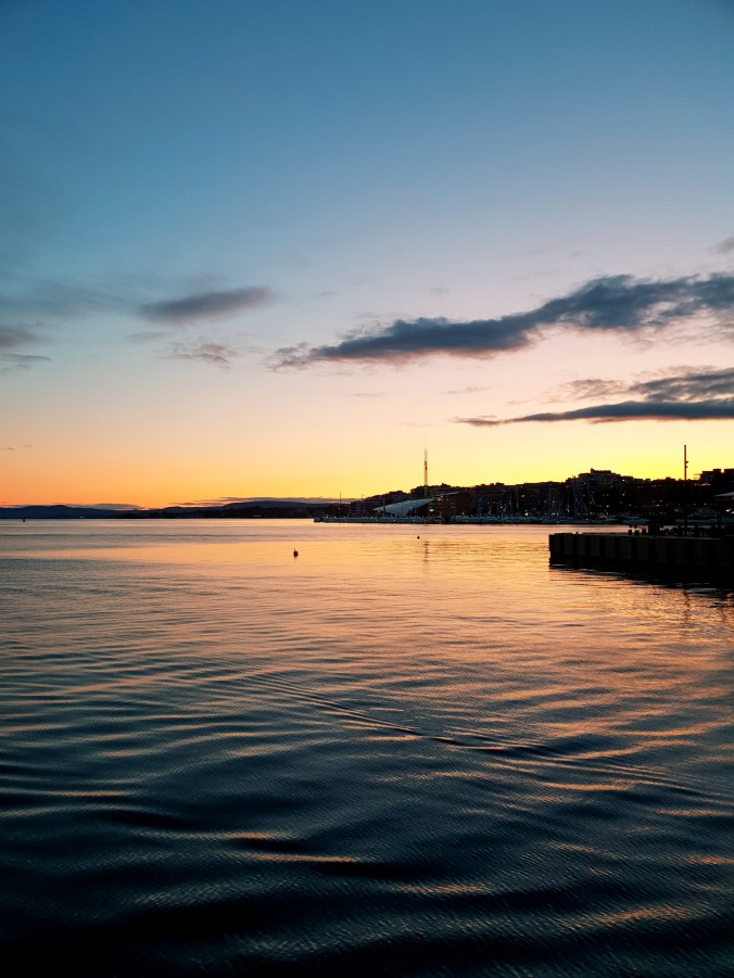 Sunset across Oslo harbour from Solsiden Restaurant
