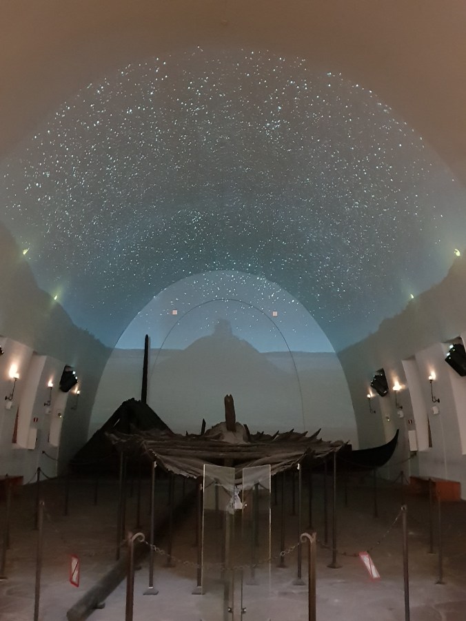 Another ship on display underneath the film projection in the Vikingskipshuset