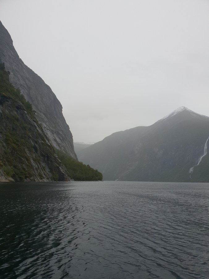 Speeding across Geirangerfjord on a RIB boat