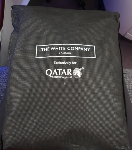 Qatar Airways business class pyjamas and slippers by The White Company