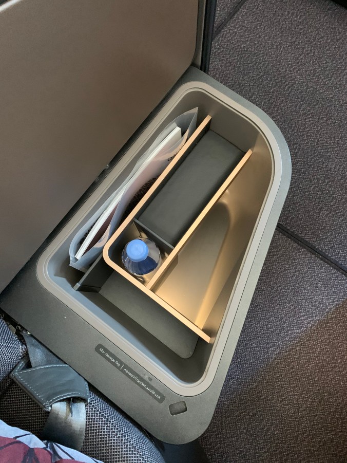 Qatar Airways business class Qsuites armrest storage