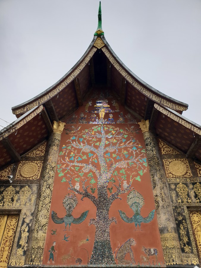 Tree of life mosaic on the ordinance hall in Wat Xieng Thong